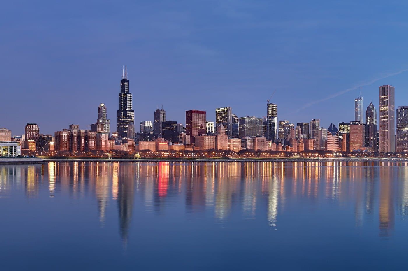 City skyline at dawn, representing the range of industries Lira serves